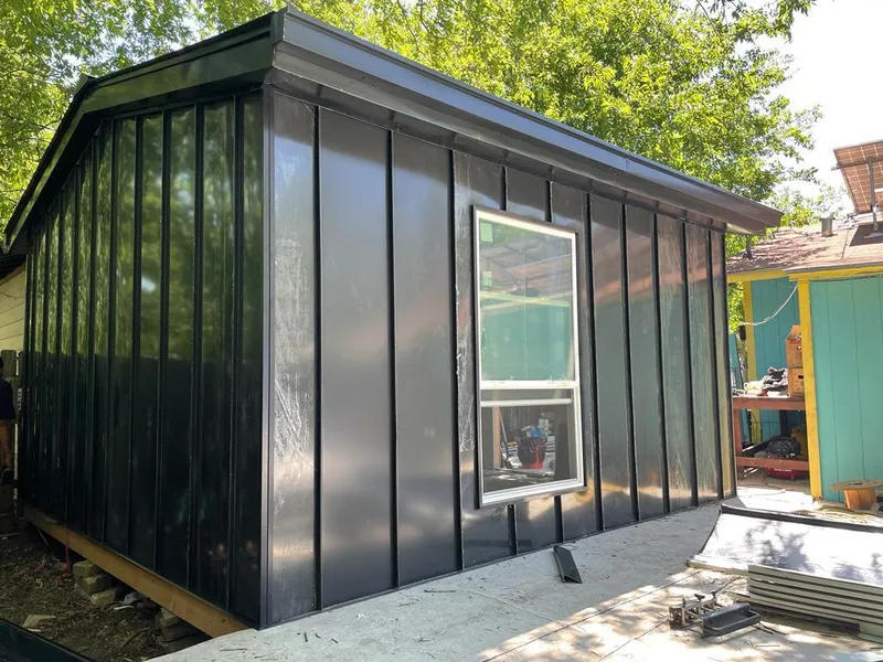 Black standing seam metal wall panels for Roof Inspection in Gainesville